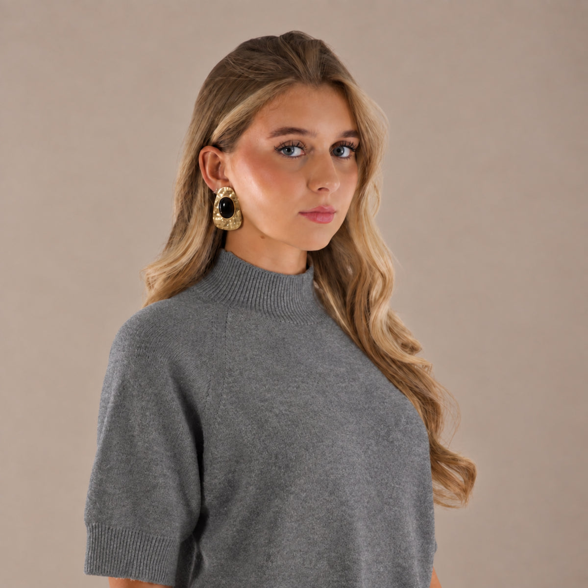 Pull col montant